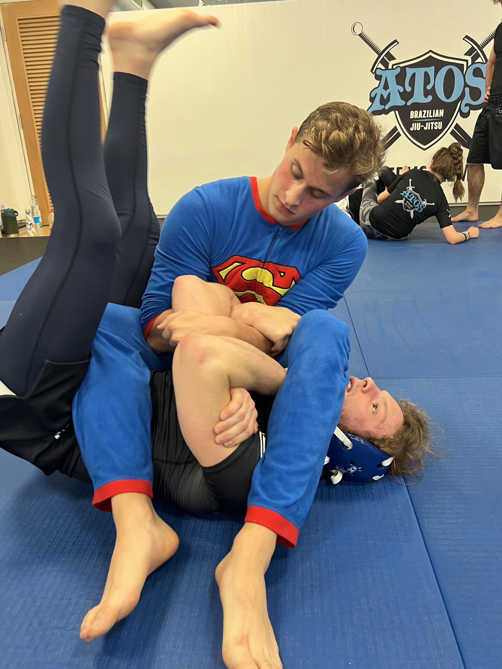 Zev Schachter demonstrating an armbar on the mats at ATOS Jerusalem.